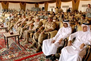 Responsables militares y civiles de Qatar y EEUU en la Base Aérea de Al Ubeid, en Qatar
