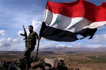 soldado-sirio-bandera