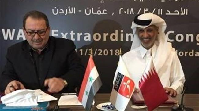 Salah Ramadan, presidente de la Federación de Fútbol Siria, y Hamad bin Jalifa Ahmed al Thani, presidente de la Federación de Fútbol de Qatar