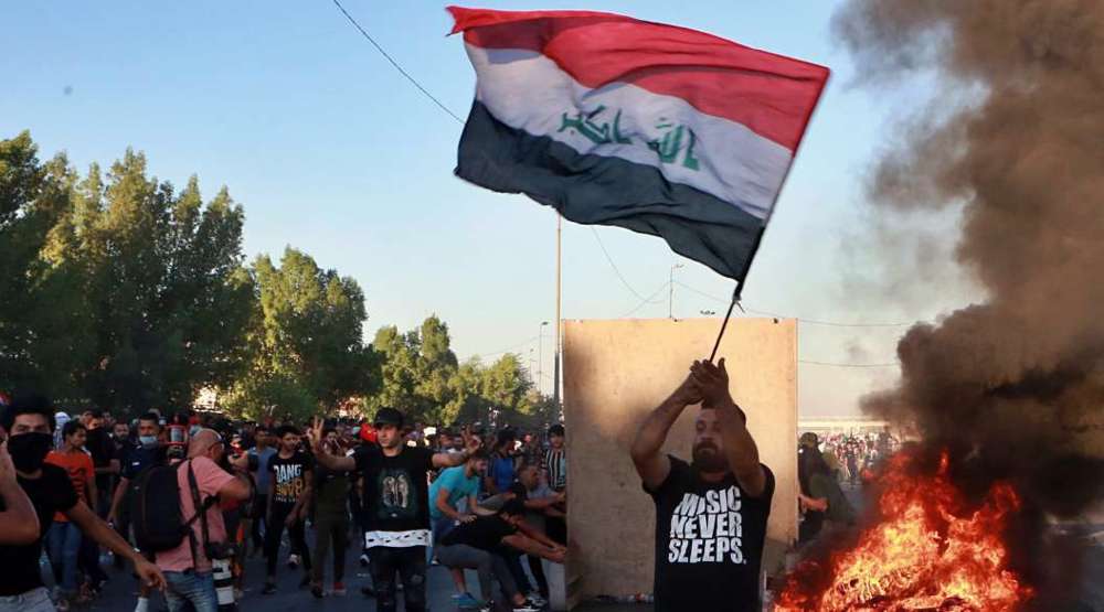 manifestacion-bagdad-bandera-iraqui