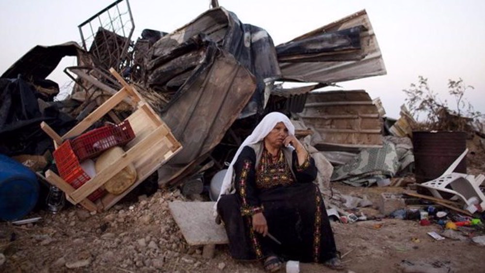 mujer-palestina-casa-destruida