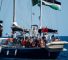 Activistas de la Coalición de la Flotilla de la Libertad abordan el barco Madleen antes de zarpar hacia Gaza. (AP: Salvatore Cavalli)